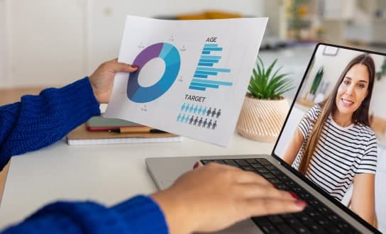 young-woman-having-video-call-over-laptop-with-bus-2023-12-19-20-56-56-utc-min